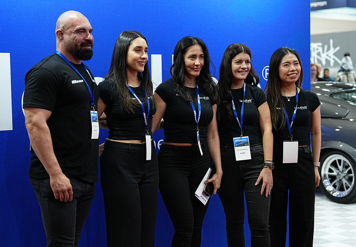 Eye-level view of an electric vehicle on display at the EV Show