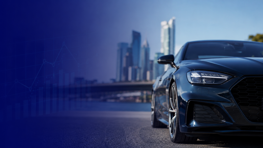 A car in the foreground with the city in the background